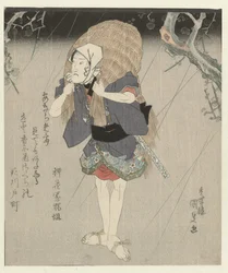 Homme en manteau de pluie en paille
