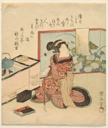 Femme attendant appuyée sur un tuyau