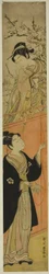 Jeune homme et femme avec un cerf-volant