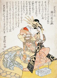Femme avec un pinceau de calligraphie