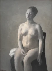 Femme nue assise