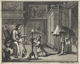 Un père effraie un enfant dans un intérieur
