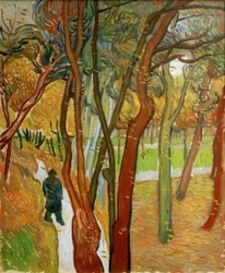 Promeneurs dans le parc avec feuilles tombantes