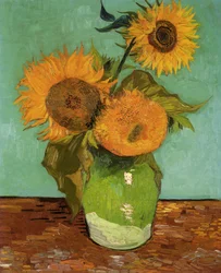 Trois tournesols dans un vase