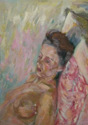 Nu féminin sur coussin