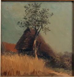 Chaumière dans le champ de blé