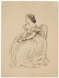 Femme assise en robe de bal