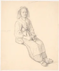 Femme suédoise assise avec du tricot