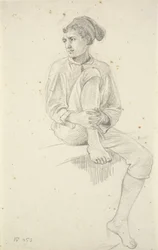 Jeune pêcheur assis