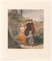 Un père avec deux enfants près de la tombe de la mère