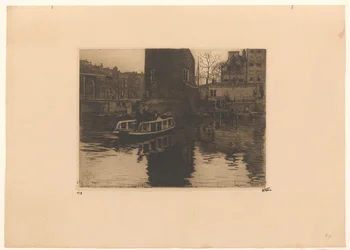 Vue sur le passage à niveau près de la Montelbaanstoren à Amsterdam
