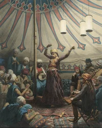 Danseuse égyptienne dans une tente, avec musiciens et spectateurs