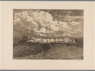 Paysage de dunes avec extraction de sable et bateaux