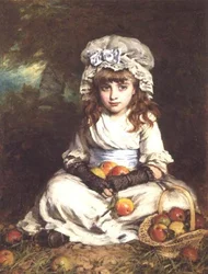 Petite fille avec un panier de pommes