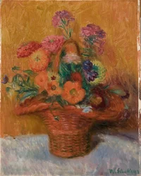 Panier rouge de zinnias