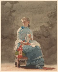 Jeune femme cousant