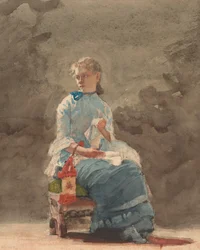 Jeune femme cousant