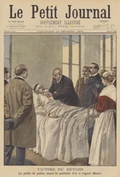 Une victime du devoir : Le préfet de police de Paris remettant une médaille à un officier blessé